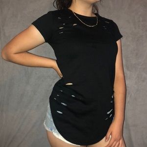 A longer ripped shirt